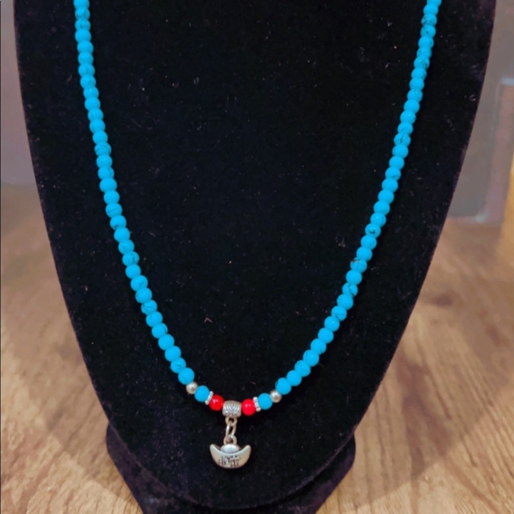 Beautiful handmade libra necklace.